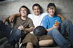 Portrait of three teenage boys smiling