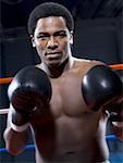 Portrait of a young man boxing