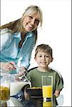 Portrait of a mother and her son at the breakfast table