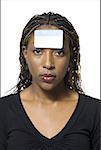 Woman with name tag on forehead