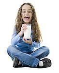 Portrait of a girl holding a glass of milk