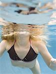 Low angle view of a girl swimming