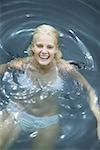 High angle view of a young woman swimming