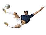 Soccer player kicking ball