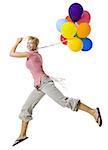 Woman with helium balloons