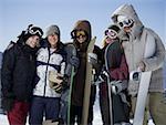 Portrait of a group of skiers and boarders