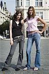 Portrait of two teenage girls standing