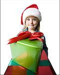 Portrait of a girl holding Christmas presents