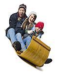 Family on toboggan