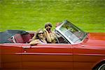 Two young women traveling in a car