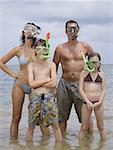 Portrait of a family wearing scuba masks and snorkels