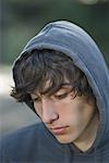 Close-up of a teenage boy thinking