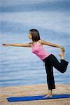 Profile of a young woman exercising