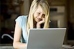 Young woman working on a laptop computer