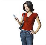 Young woman holding a mobile phone