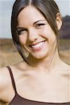 Close-up of a young woman smiling