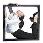 Female contortionist businesswoman inside the box