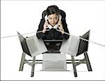 High angle view of a businesswoman multi-tasking