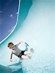 Boy on a waterslide