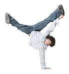 Portrait of a teenage boy performing one armed handstand