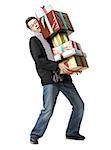 Portrait of a young man holding a stack of gifts