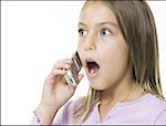 Close-up of a girl talking on a cell phone