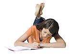 Close-up of a girl writing in a notebook