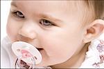 Close-up of a boy with a pacifier
