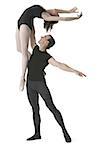 Male ballet dancer lifting a female ballerina