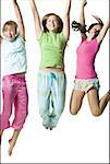 Three girls jumping