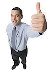 Portrait of a mid adult man showing thumbs up