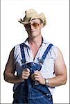 Farmer wearing a straw hat with sunglasses