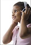 Close-up of a girl listening to music