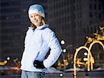Girl with braces smiling outdoors in winter