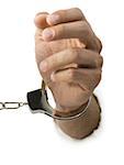 Close-up of hand in handcuffs