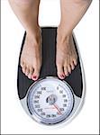 Bare feet standing on a scales. Lose weight concept with person on a scale  measuring kilograms. Weight Scale, Underweight man on Scale Stock Photo -  Alamy