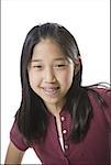 Close-up of a teenage girl smiling