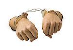 Close-up of hands in handcuffs