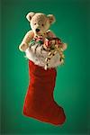 Christmas stocking with teddy bear and candy canes