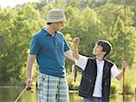 man and his son fishing