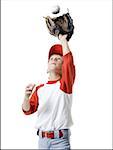 Close-up of a baseball player catching a baseball