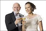 Portrait of a senior couple toasting with wine glasses