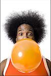 Basketball player with an afro blowing a bubble