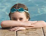High angle view of a girl peeking from a pool
