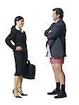 Businesswoman talking and smiling with businessman in boxers