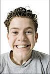 Portrait of a teenage boy grinning