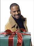 African American man with Christmas gift