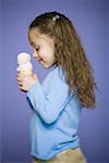 Profile of a girl holding an ice cream cone