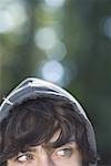 Close-up of a teenage boy looking away