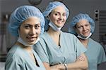 Portrait of three female surgeon smiling